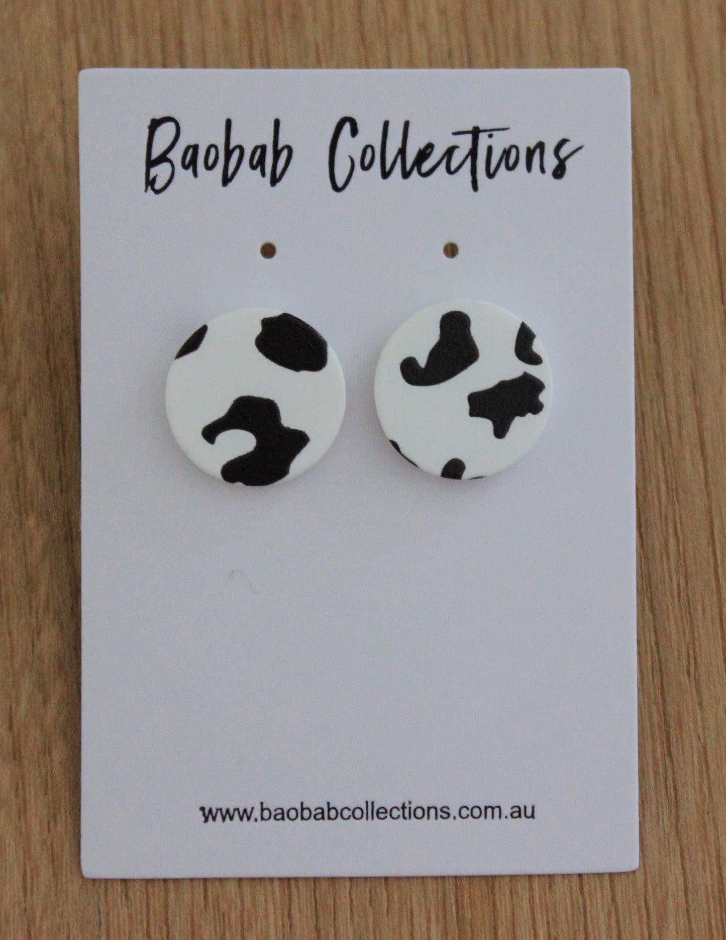 Jungle Stud: Black & White Cow Print