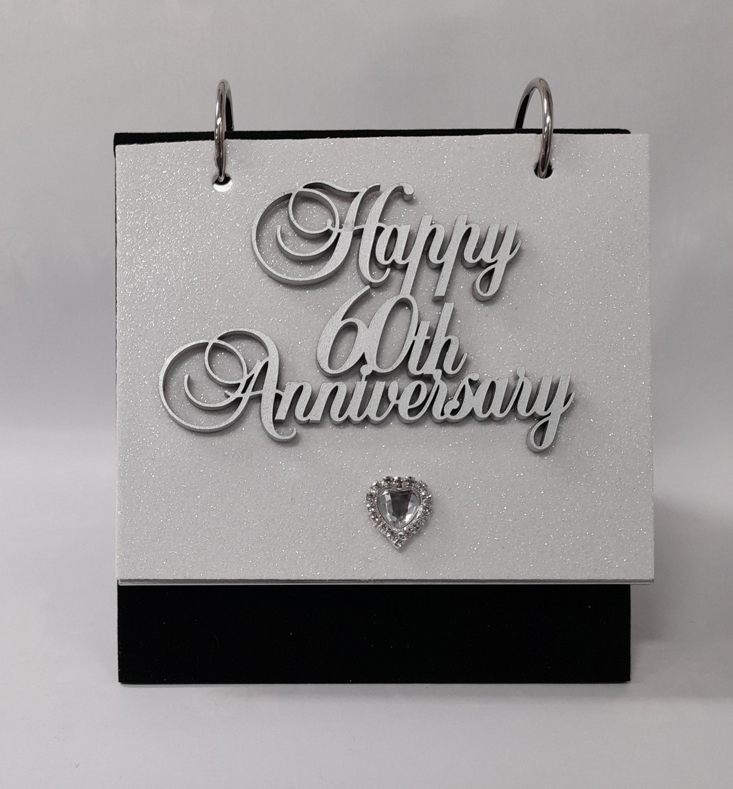 60th Anniversary Flip Album - Silver writing on white sparkle background with diamonte heart